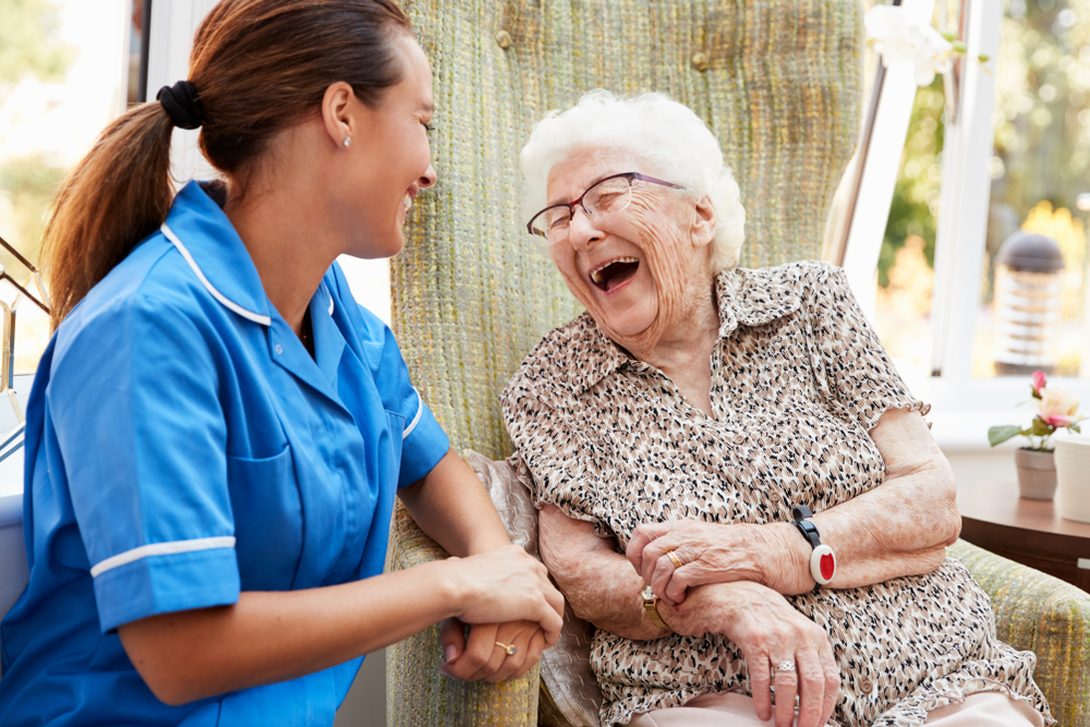 senior citizen happily living in an assisted living facility.