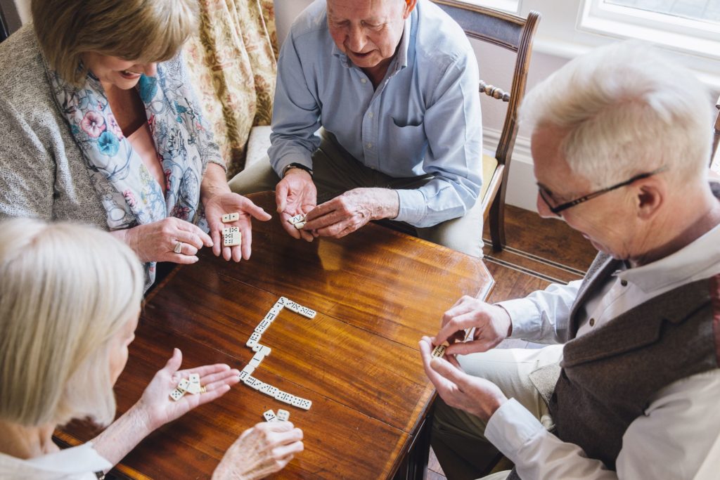 senior citizens playing games in a retirement community